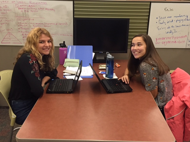 Seniors Libby Hartung and Frances Fulton working on their projects in the library. 
Photo courtesy of Marc Carraway