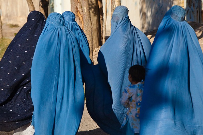 Afghan women wearing burqas. 