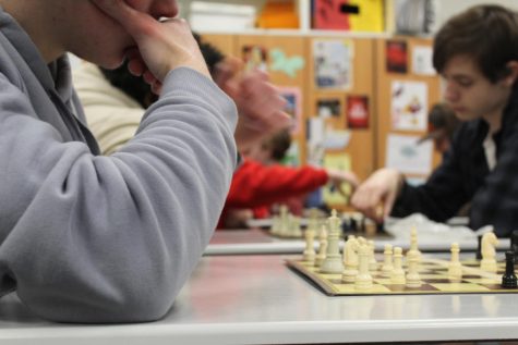 Students practice their chess game in Chris Zemas Chess Club.