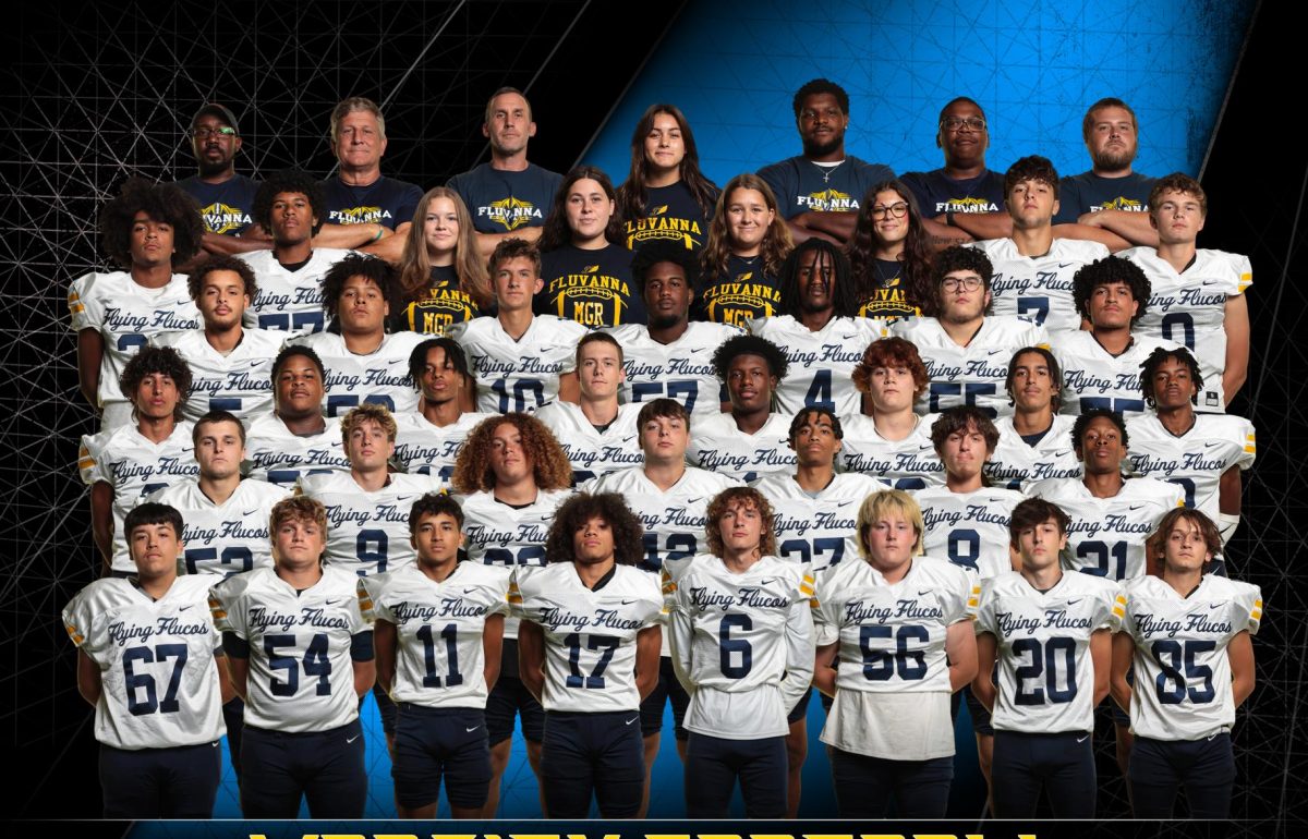 The fall 2023 varsity football team. Assistant Coaches Jayvon Jackson and Brandon Townes are in the top row, third and second from the right, respectively. 