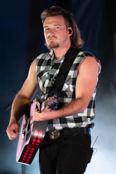 Morgan Wallen, an American country music artist performs his hit single “Whiskey Glasses” during Freedom Fest, June 28, 2019, at the Iron Horse Park, Fort Carson, Colorado.
U.S. Army photo by Spc. Robert Vicens - https://www.dvidshub.net/image/5592100/freedom-fest-2019
- Public Domain