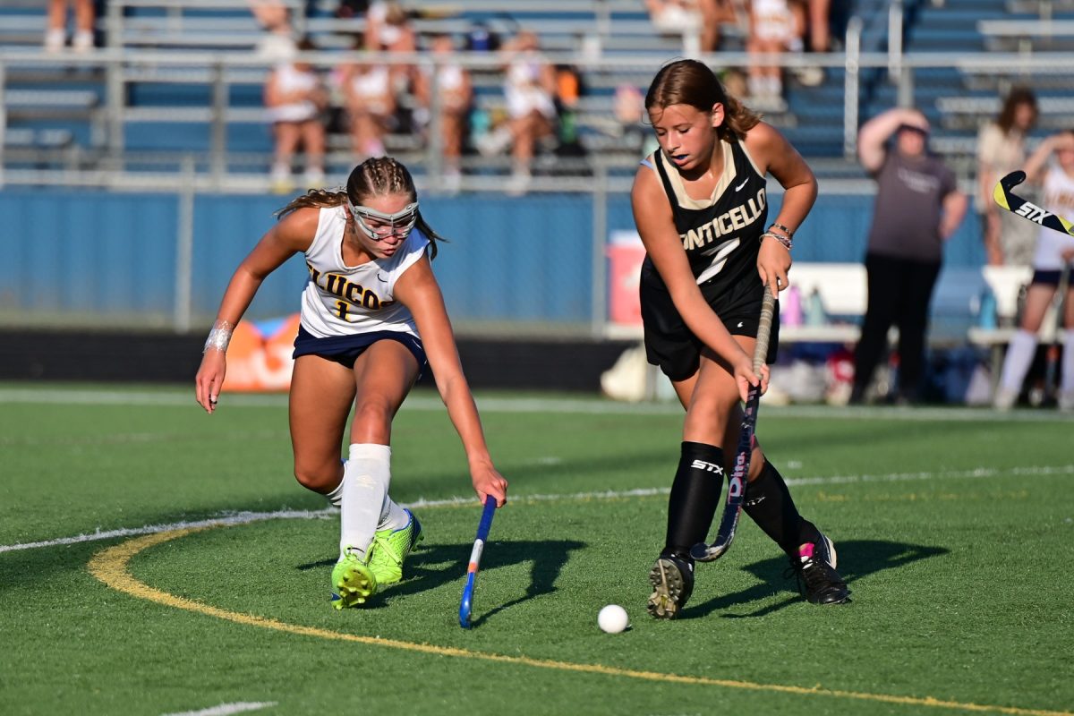 Fluco field hockey team playing Monticello