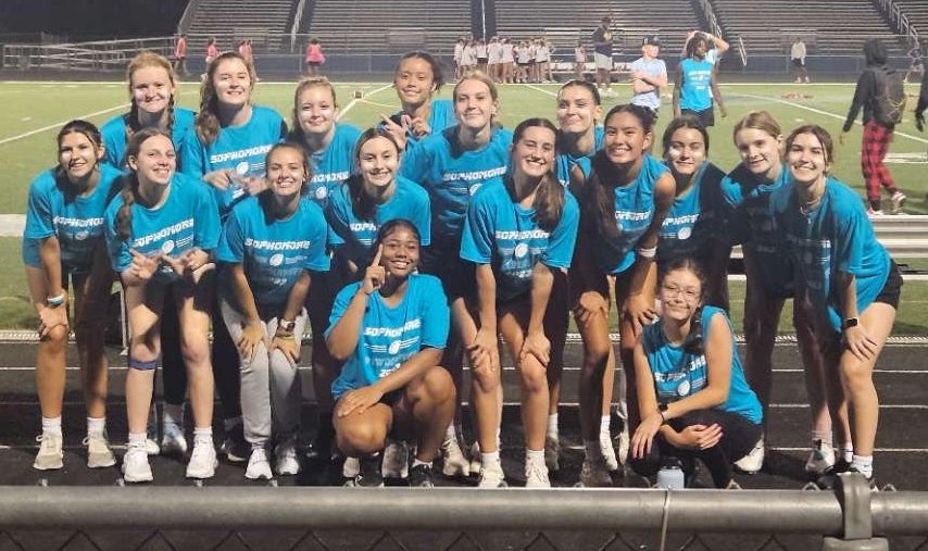 Sophomore PowderPuff team poses for a photo after winning their first game against the juniors.