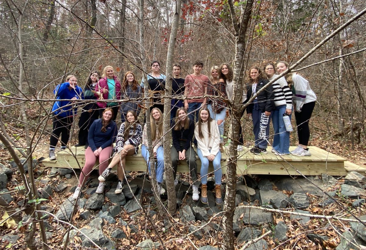 SGA members pose for a photo on the new bridge in The Woodlands. Photo Courtesy of David Small