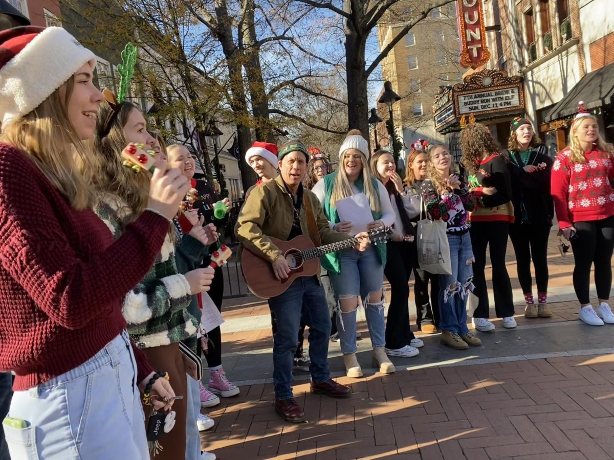 Members of the FCHS SGA and Mr. Small go caroling on the Downtown Mall before Winter Break. 