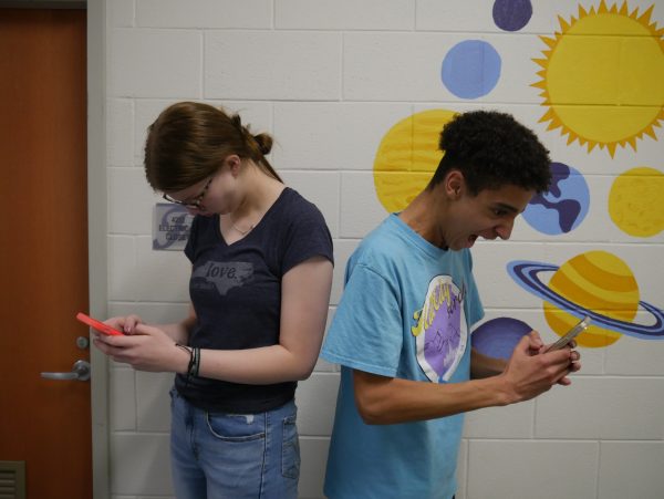 FCHS students Audrey Jones and Duncan Ferrell portray a couple arguing through social media. Photo courtesy of Cecily McMillian.