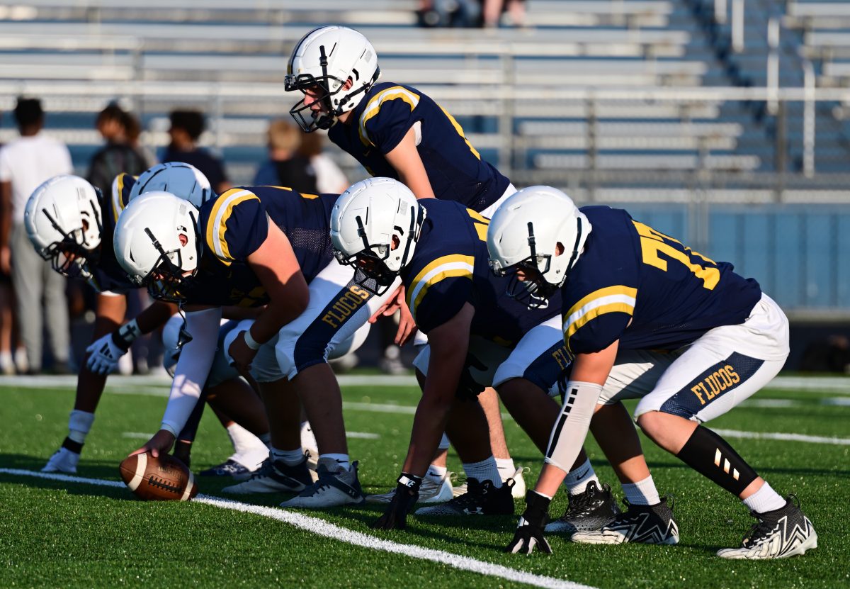 The Offensive linemen "Pre-Snap" on Sept. 11 at FCHS. Photo courtesy of DLH Sports Shots.