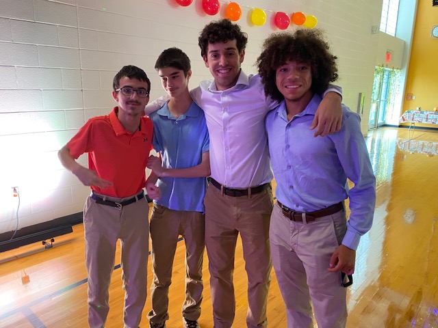 George Gibson and Owen Seay with SGA members Kameren Green and Art Maqani at the Our Hoco dance on Sept. 26 in the Auxiliary gym. Photo courtesy of SGA. 