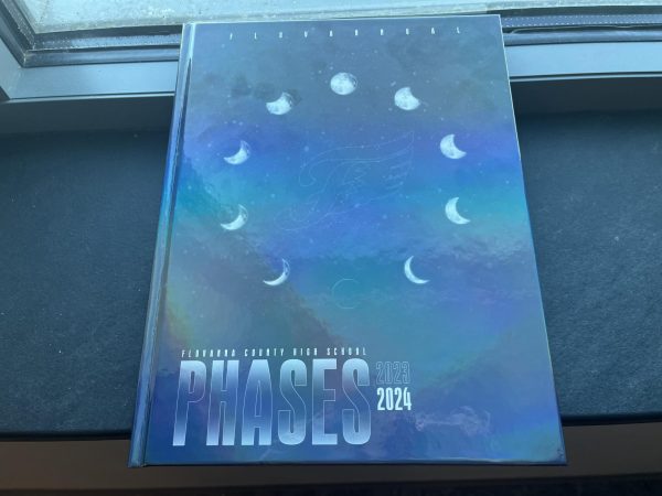 The holographic cover of the 2024 FCHS "Phases" Yearbook. 