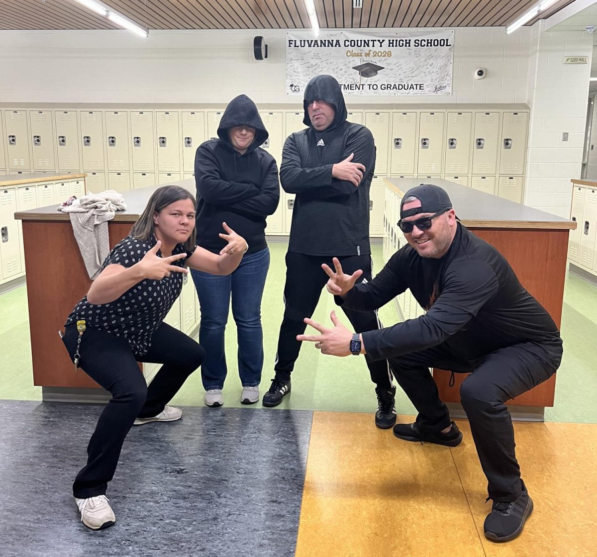  Teachers Ashley Goode, Rachael Newsom, Jason Davis, and Jason Barnett were decked out in black for the "Undercover Teacher" Teacher Spirit Week day on Nov. 22. 