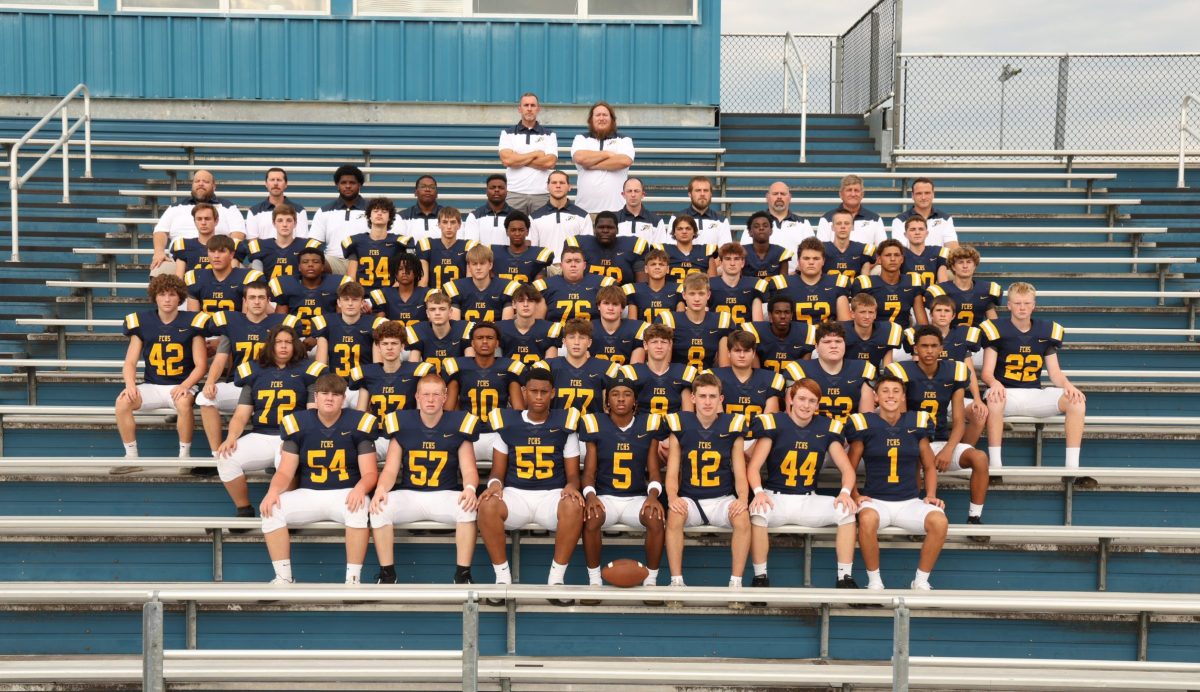 The FCHS junior varsity football team and its coaches. Photo courtesy of TSS Photography.