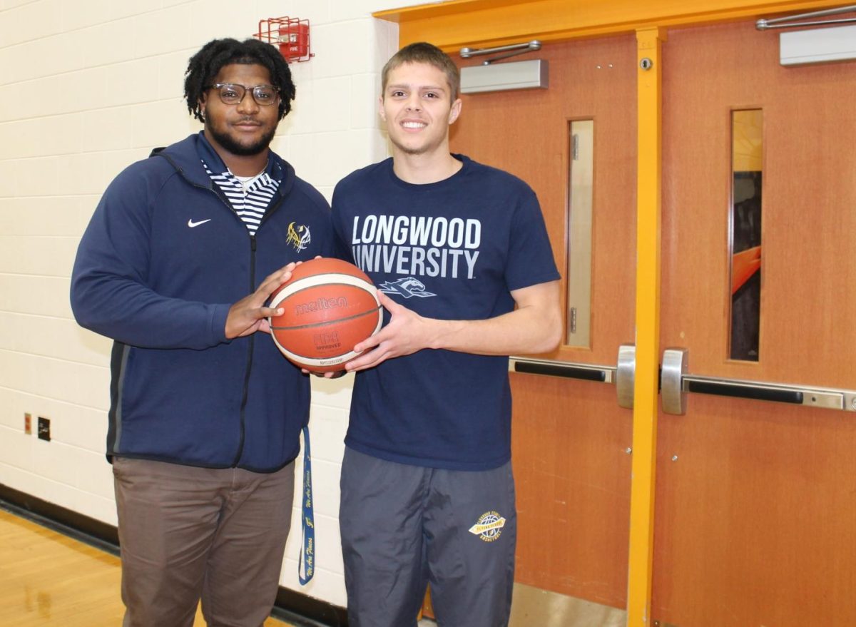 Mason Kirby (right) and his coach, Jay'von Jackson.