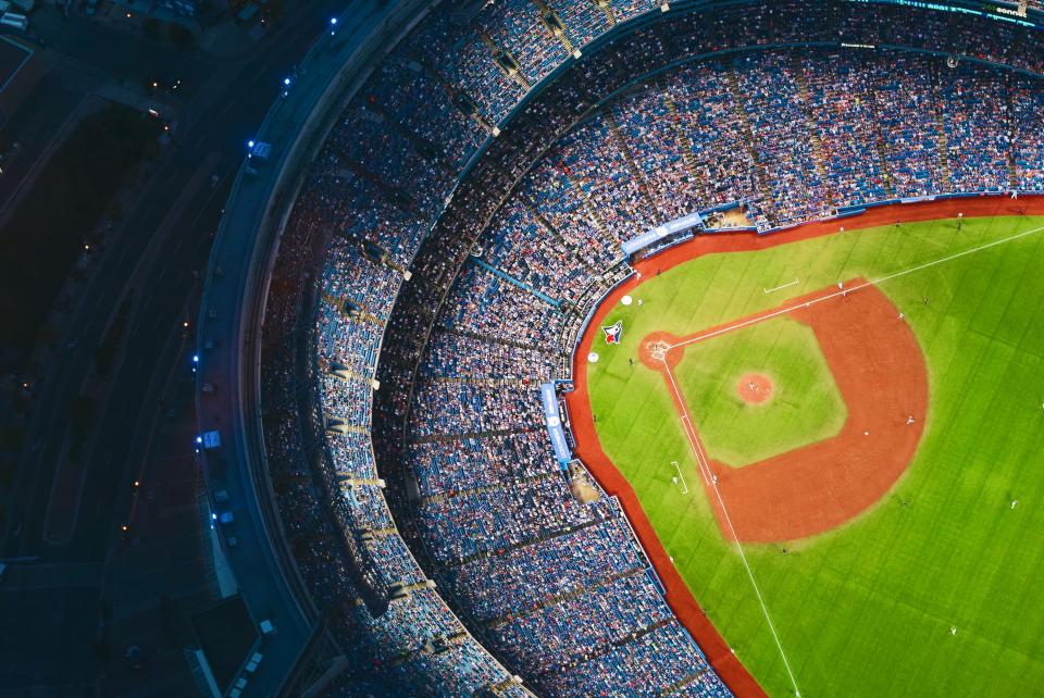 Aerial view of a baseball field. Photo courtesy of Tim Gouw on Stocksnap.com under CC0 1.0 Universal. https://stocksnap.io/photo/baseball-stadium-HZ4BHM2FSC 