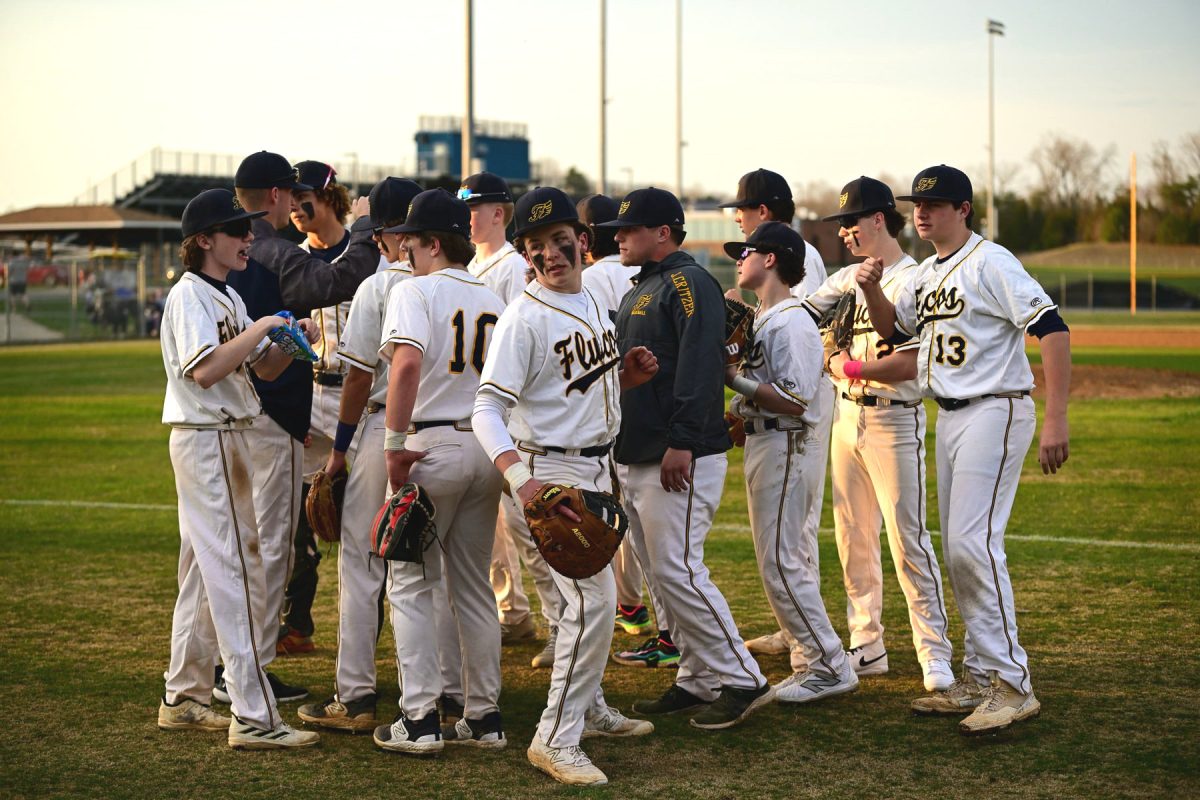 JV baseball huddles up and breaks before the game on Mar. 14, 2024