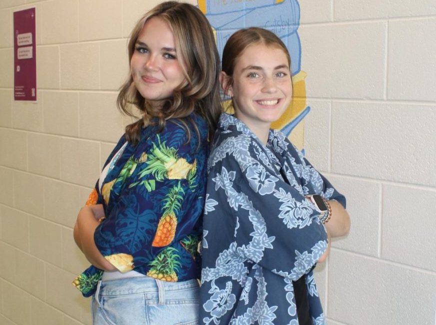 Senior Allison Rhoades and freshman Charlotte Gifford show their spirit on "Tropical Thursday."