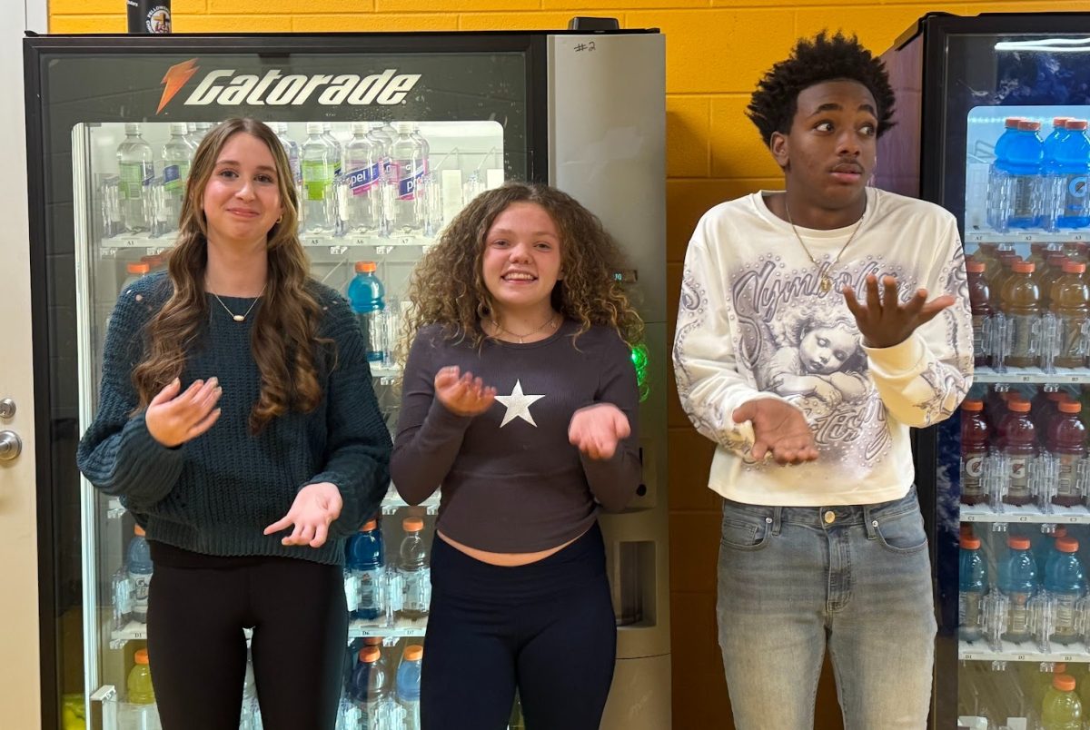 FCHS students doing the "six-seven" meme.