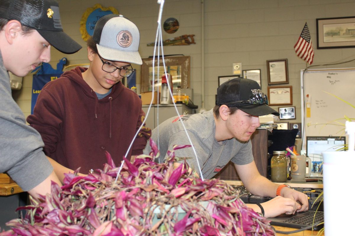 “[FFA is] student run and allows students to voice their opinions on policies at the Capital to legislators,” said Thompson. Here, students Dakota Martin ‘28, Mason Henderson ‘29, and Caleb Kimble ‘29 work alongside each other on their course work. 