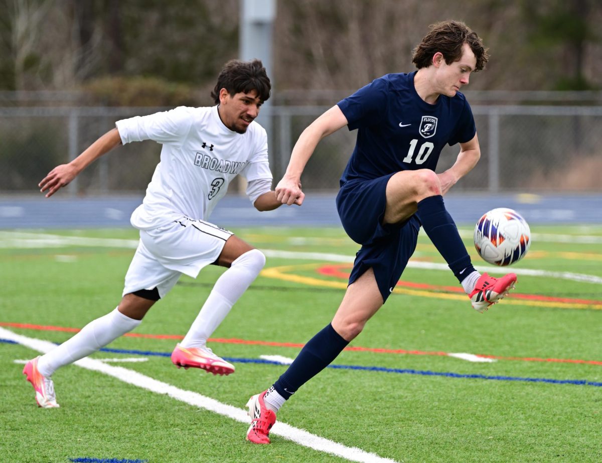 Senior Sean Southall takes the ball down the field at a game in April. 