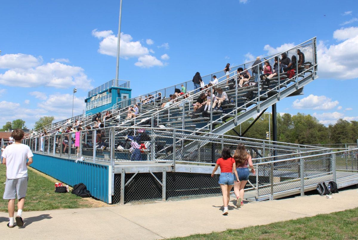 Students gather around the bleachers as the Suicide Prevention Walk on April 17.