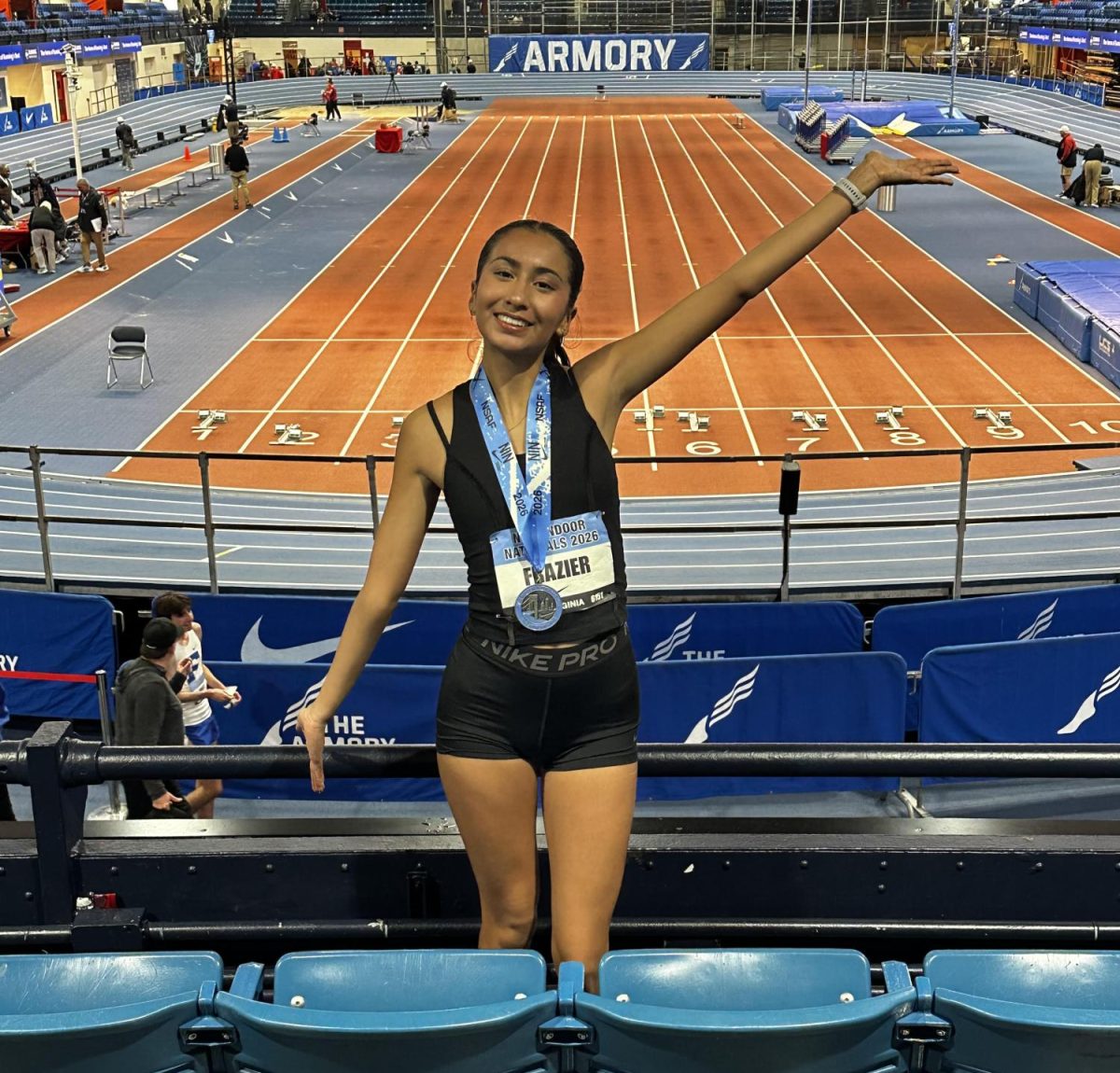 Ruby Frazier in front of Nike Nationals track